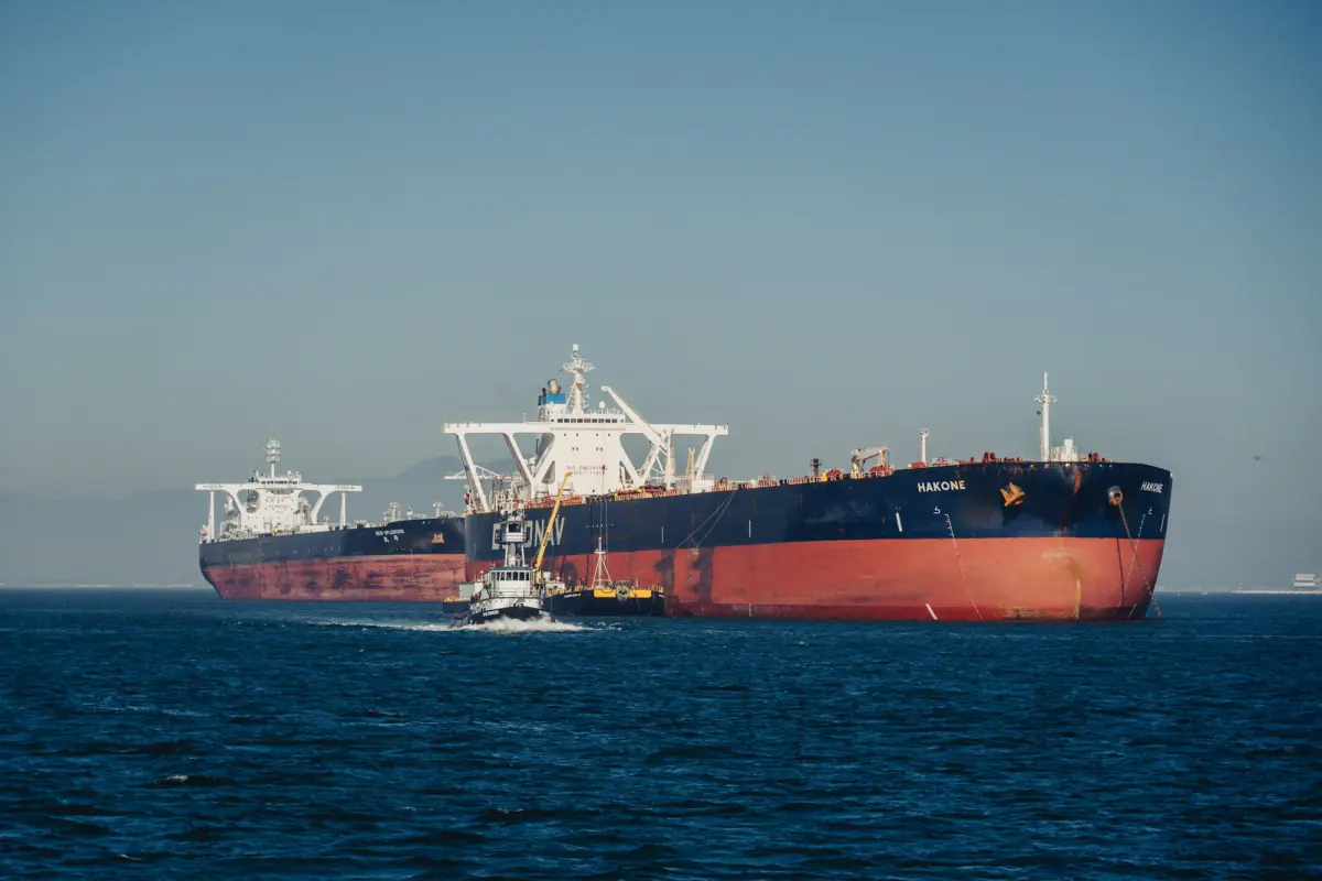 Tanker with tugboat on the open sea