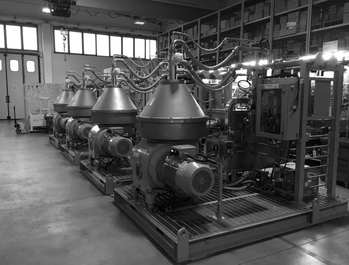 Macfuge disc stack centrifuges on their skids in the workshop